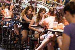 students sitting at tables